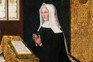 A portrait of Margaret, painted c1510. She was apart from her son for most of his young life, but strove to restore his earldom of Richmond (Image by Alamy) A woman wearing a black dress and white hood, praying in front of a Bible