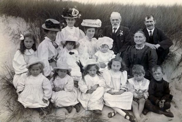 Photo of an Edwardian family on sand dunes