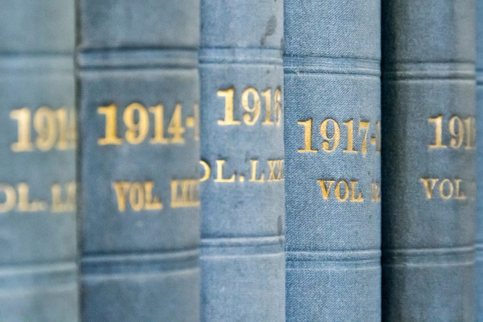 Hansard, the official record of British parliamentary debates compiled by reporters is another vast repository of information that AI can help interrogate (Image by Alamy) A line of light blue book spines with gold words on them, each with a year and volume number on them