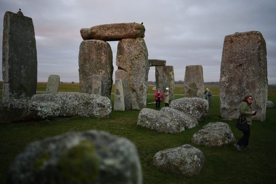 People visit the prehistoric monument Stonehenge in January 2022