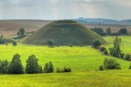 A panorama of the man-made Neolithic structure Silbury Hill in Wiltshire