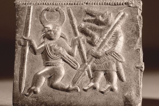 This 6th-century matrix from Torslunda, Sweden, was used to create helmet plaques depicting armed figures — likely berserkers — wearing horned helmets with bird motifs and animal masks. Such imagery evokes the warrior culture later embraced by Viking champions like Thorkell the Tall, a famed Jomsviking commander known for his fierce loyalty and shifting allegiances during the early 11th century.