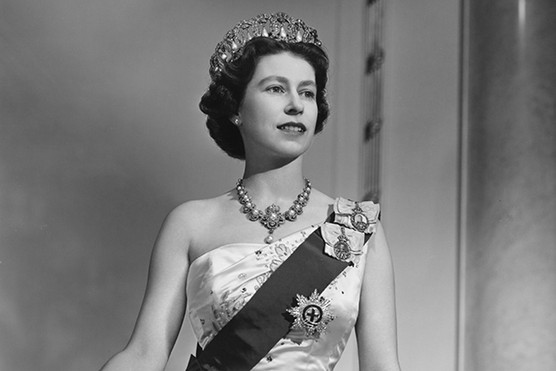 Elizabeth II poses for a portrait in Buckingham Palace in December 1958