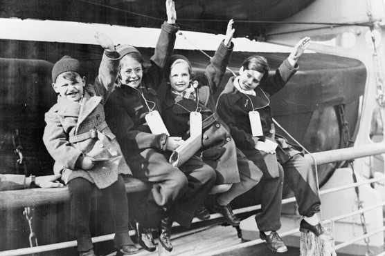 Four young members of the largest group of Kindertransport refugees arrive at Southampton, England, in March 1939. (Photo by Fox Photos/Getty Images)