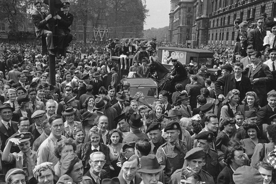8 May 1945: Crowds celebrate VE Day in London, at the end of World War 2. (Photo by Picture Post/Hulton Archive/Getty Images)