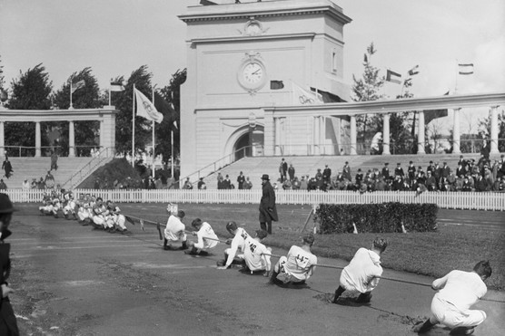 Belgium and the Netherlands compete in a tug of war at the Antwerp Olympic