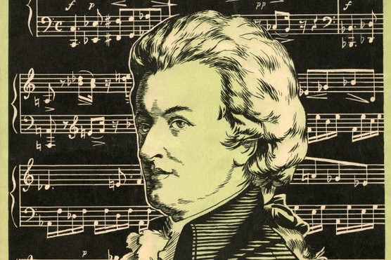 Vintage illustration of Wolfgang Amadeus Mozart in profile, in front of a musical score