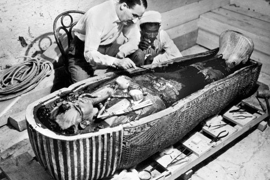 Egyptologist Howard Carter near golden sarcophagus of Tutankhamun in Egypt in 1922.