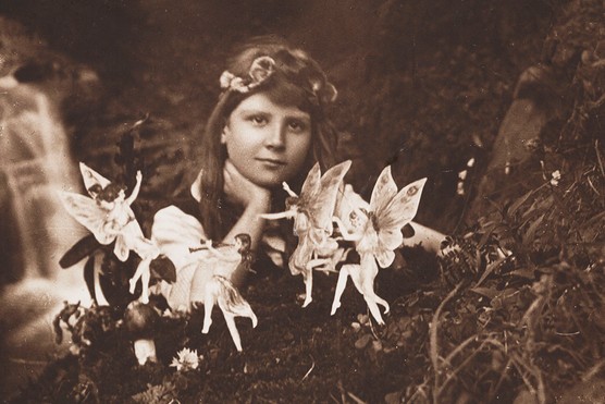 Frances Griffiths poses with the fairies