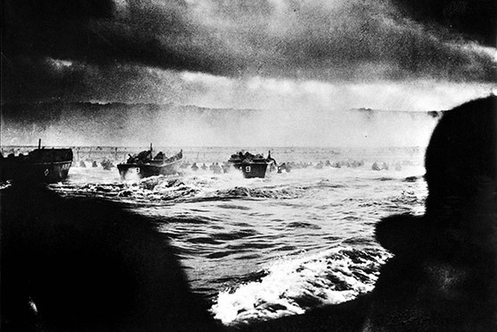 British troops land in Normandy on 6 June 1944. D-Day, and the complex operations that followed, would not have been possible without Allied sailors (Photo by Photo 12/Universal Images Group/Getty Images)