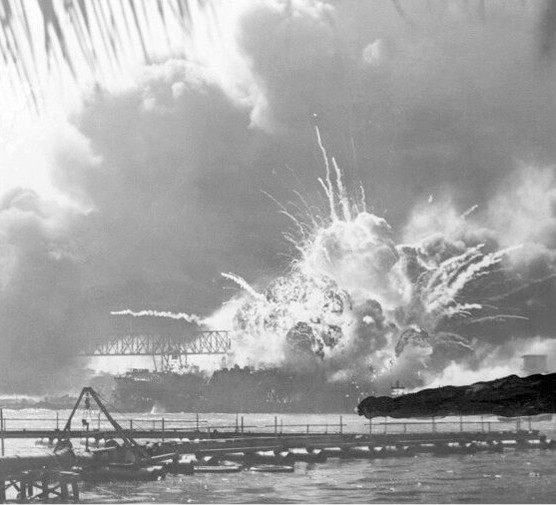 The destroyer USS Shaw explodes in a massive fireball at Pearl Harbor, 7 December 1941. The attack led almost immediately to Germany declaring war on America, and so brought Stalin an unexpected ally of colossal potential power, says Laurence Rees. (Bettmann/Getty Images)