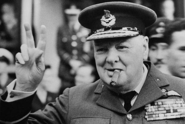 Winston Churchill gives his famous v-sign as he opens the new headquarters of 615 (County of Surrey) Squadron of the RAAF (Royal Auxiliary Air Force) at Croydon, 1948. (Photo by Central Press/Hulton Archive/Getty Images) Winston Churchill gives his famous v-sign as he opens the new headquarters of 615 (County of Surrey) Squadron of the RAAF (Royal Auxiliary Air Force) at Croydon, 1948. (Photo by Central Press/Hulton Archive/Getty Images)