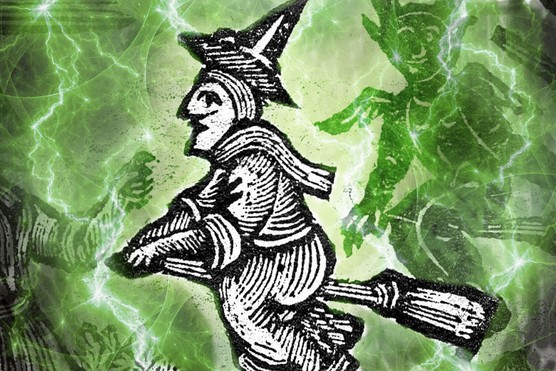 An illustration of a witch on a broomstick, wearing a pointed hat.